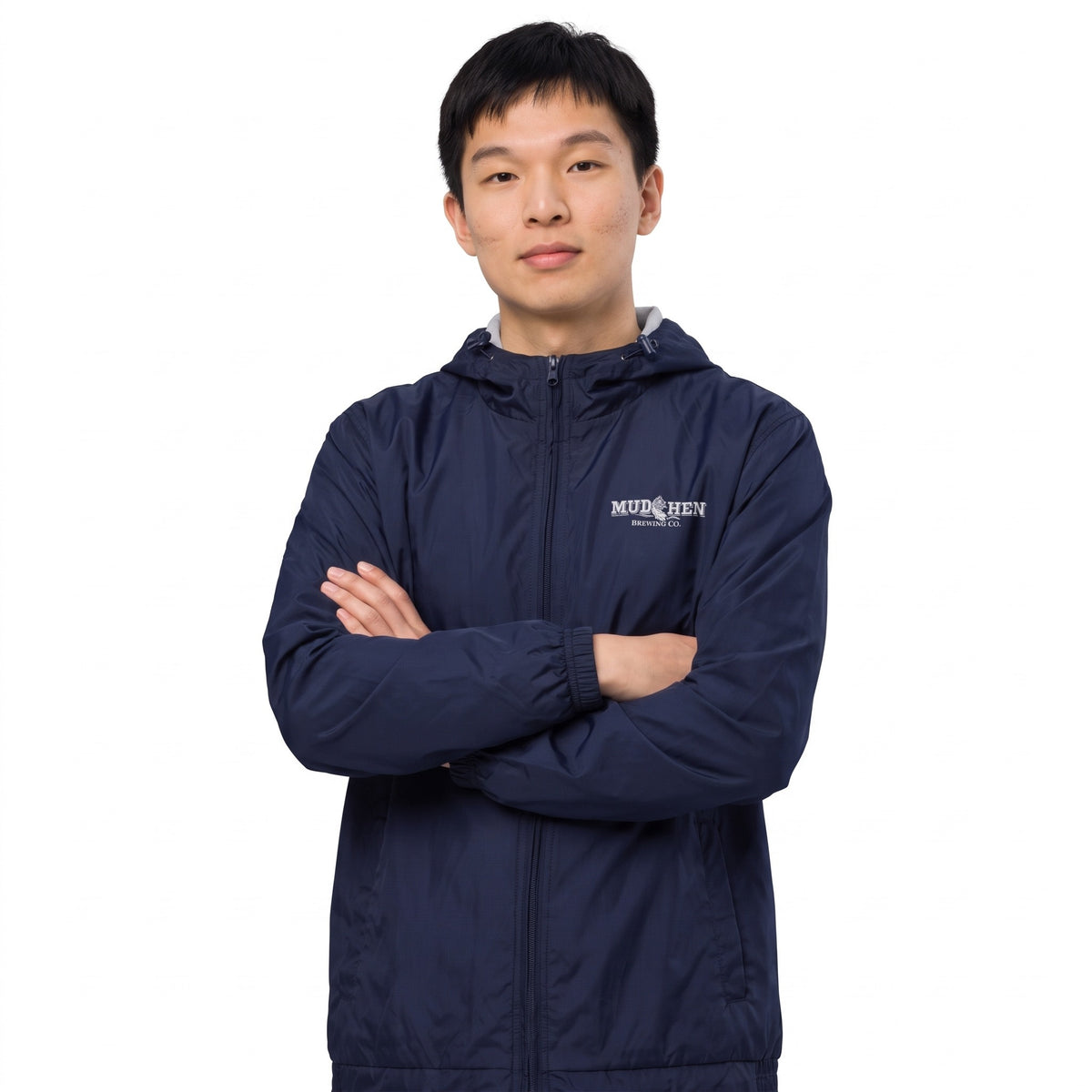 Coastal Windbreaker – Navy, front, on a man